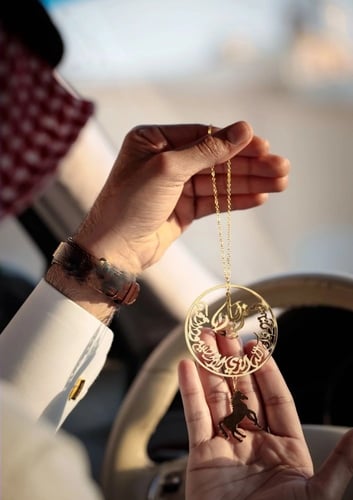 تعليقه سيارة بالاسم