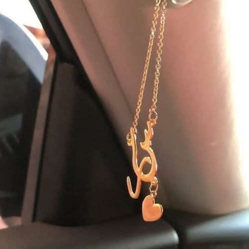 تعليقة سيارة اسم وقلب