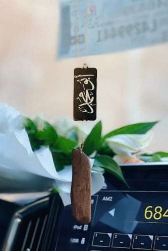 تعليقة سيارة عود