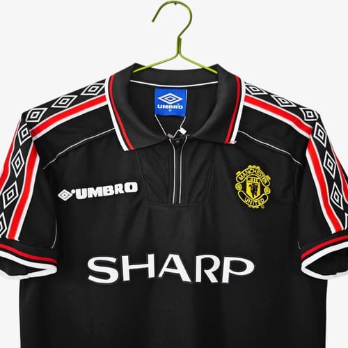 قميص مانشستر يونايتد الكلاسيكي – الأسود راعي Sharp