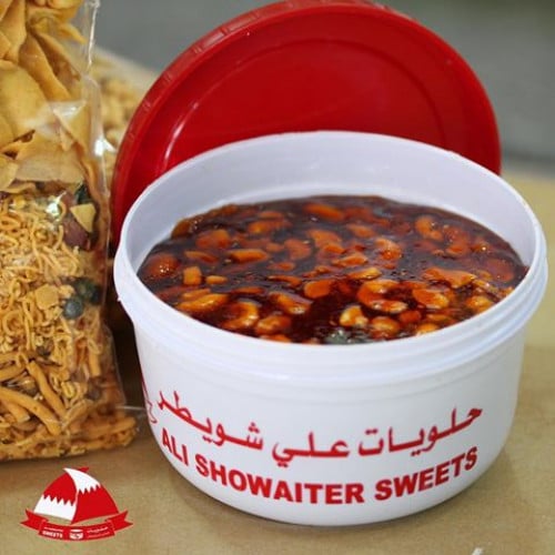 حلاوه بحرينيه 3علب ب66 مع الملاعق