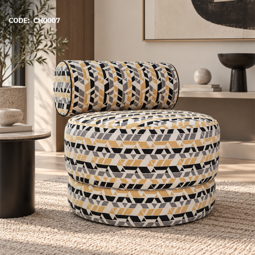 كرسي مفرد دائري بتصميم مودرن ونقوش هندسية ملونة