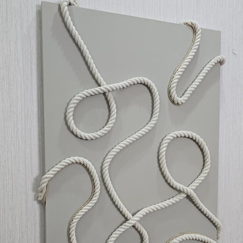 لوحة جدارية فنية تصور تداخل حبال بصورة فنية تجريدي...