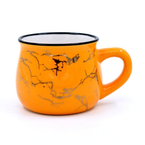 كوب زجاجي صغير بلون اصفر مع نقش رخامي ذهبي وتصميم...