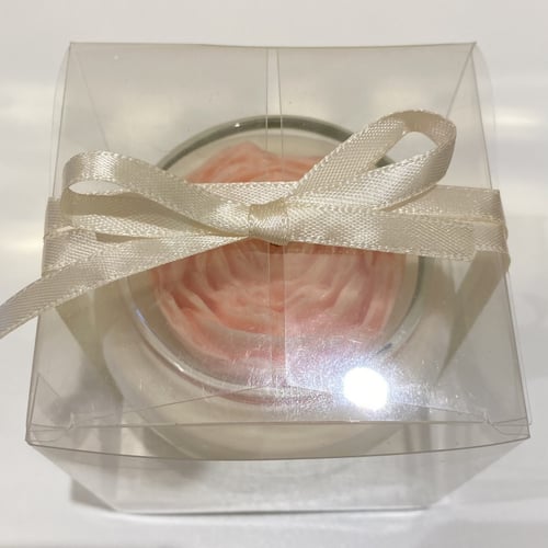 شمعة زجاجية مع وردة