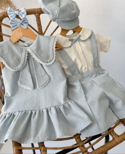 طقم ولادي مكون من ٣ قطع ( قميص ابيض + افرهول سماوي...