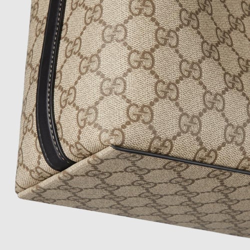 Gucci | GG Emblem medium tote bag | beige and dark...