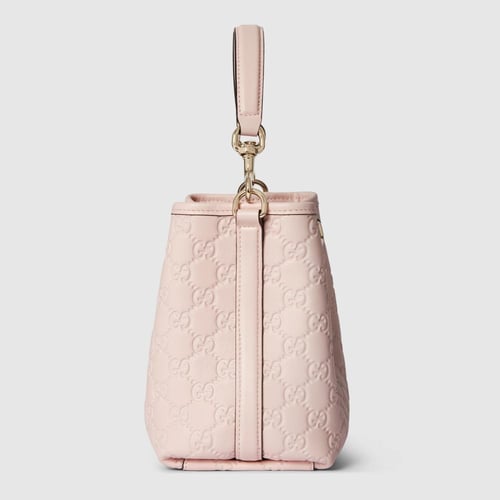 Gucci | GG Emblem small bucket bag | pink GG leath...
