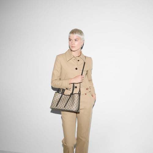 Gucci | GG Emblem medium tote bag | beige and dark...