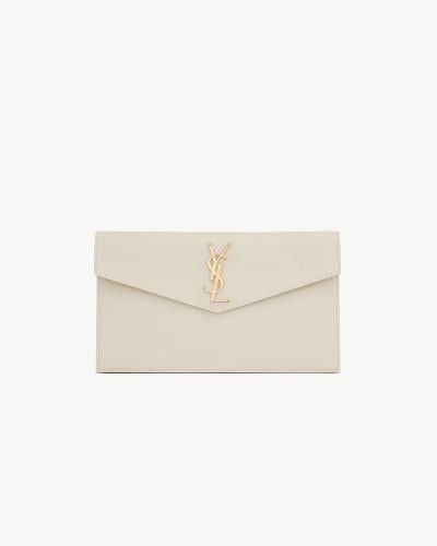 Saint Laurent | UPTOWN powder grain leather pouch...