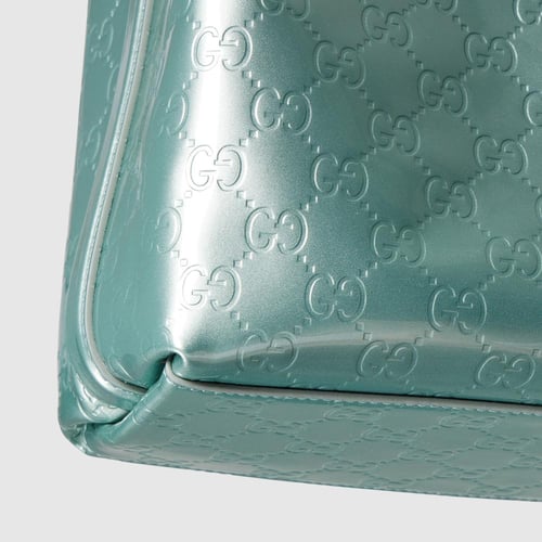 Gucci | GG Emblem small bucket bag | light blue GG...