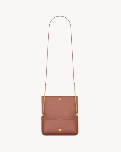 Saint Laurent | CASSANDRE LEATHER PHONE CASE | BAR...