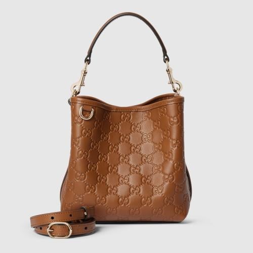 Gucci | GG Emblem small bucket bag | brown GG leat...