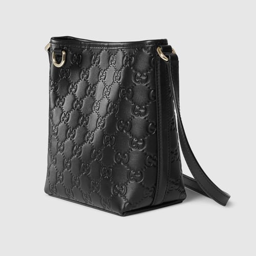 Gucci | GG Emblem nano bucket bag | black GG leath...