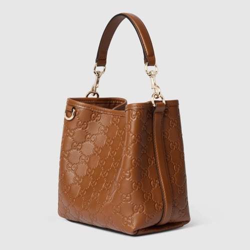 Gucci | GG Emblem small bucket bag | brown GG leat...