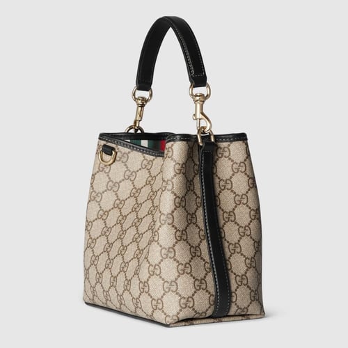 Gucci | GG Emblem small bucket bag | beige and dar...