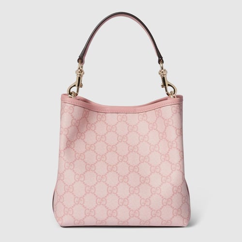 Gucci | GG Emblem small bucket bag | light pink co...