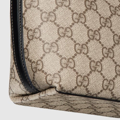 Gucci | GG Emblem nano bucket bag | beige and dark...