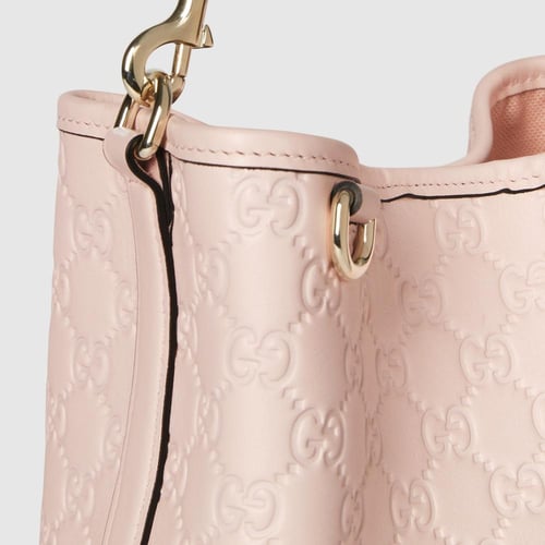 Gucci | GG Emblem small bucket bag | pink GG leath...