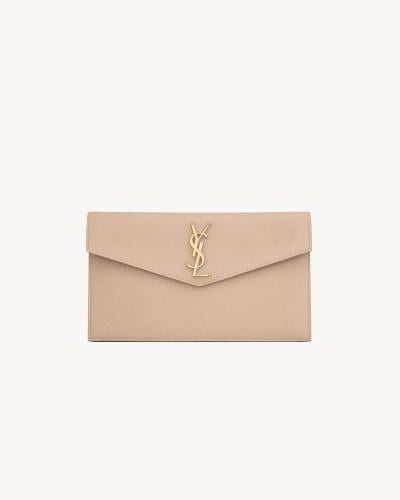 Saint Laurent | UPTOWN powder grain leather pouch...