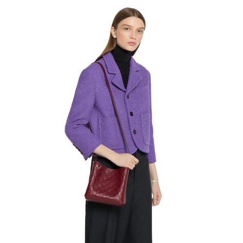 Gucci | GG Emblem small bucket bag | Rosso Ancora...