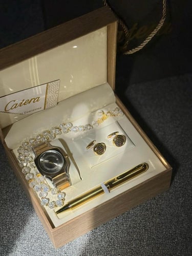 طقم رجالي ذهبي مع فضي Catera