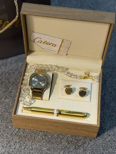 طقم رجالي ذهبي مع فضي Catera