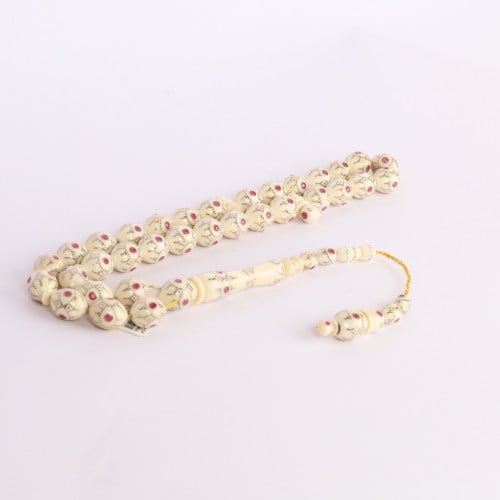 عاج بالذهب والياقوت