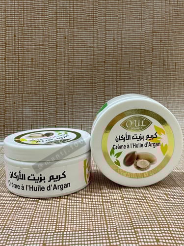 مرطب بالزيت الاركان تفتيح وتوحيد