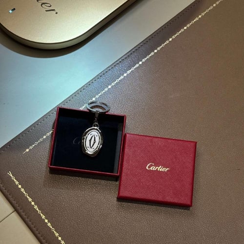 ميدالية مفاتيح من كاريته | KEY RING