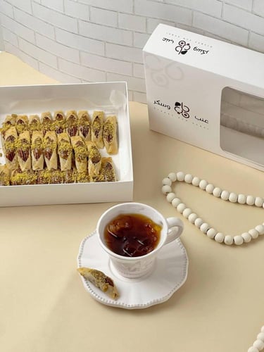 قمرا ( بقلاوة بالبيكان والكراميل)