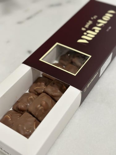 سنيكرس حكاية ميلا