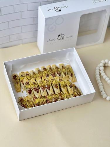 قمرا ( بقلاوة بالبيكان والكراميل)