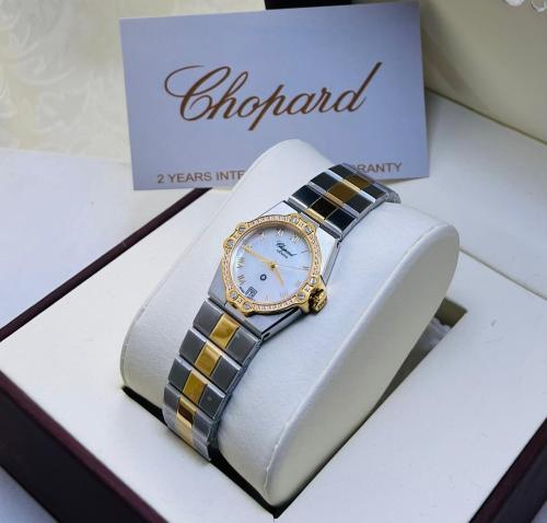 ساعة شوبارد ذهبي وفضي بإطار أبيض شامل الملحقات