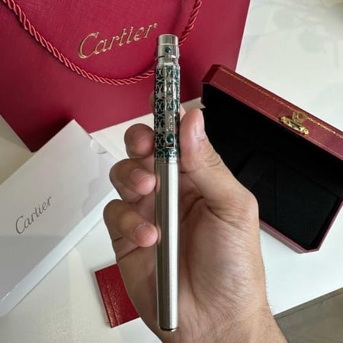 قلم كارتييه مع تنسيق ورد وتوصيل