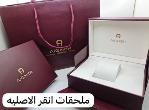 ساعة انقر فضي و ذهبي بإطار أسود ماستر كوبي