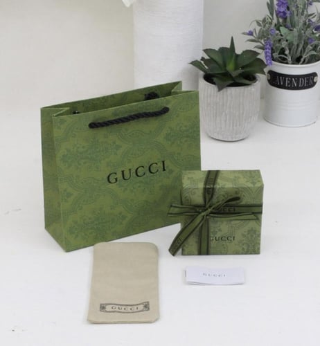 سوارة قوتشي فضي