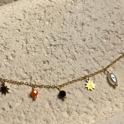 خلخال ذهبي يتدلى من اشكال مختلفه (0098)