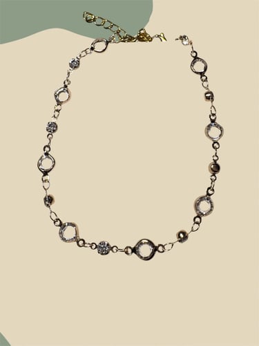 Golden ankle bracelet and transparent circles
