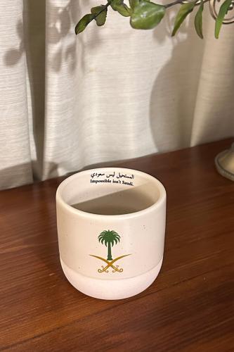 كوب سيفين ونخلة