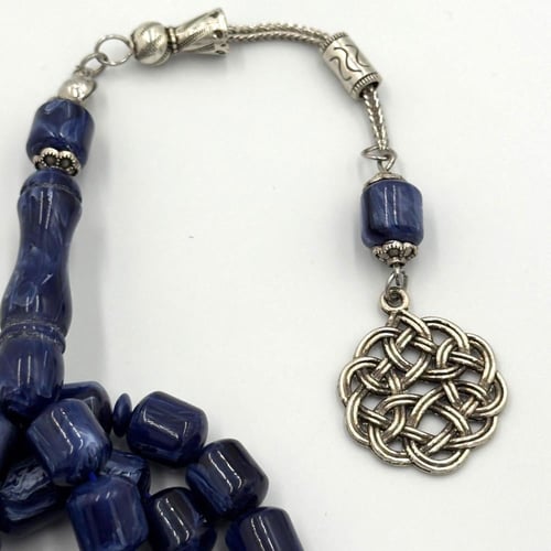 سبحة بكلايت لون كحلي مموج قصة برميلي - طربزونة معد...