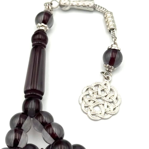 سبحة بكلايت لون اسود شفاف خيط عنابي- طربزونة معدن