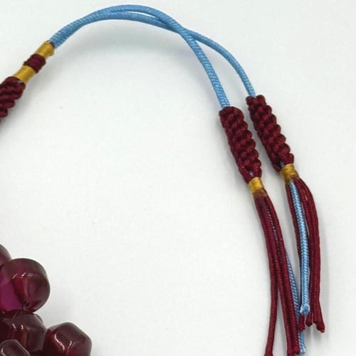 سبحة زعفران لون عنابي شفاف قصة بليه بوز