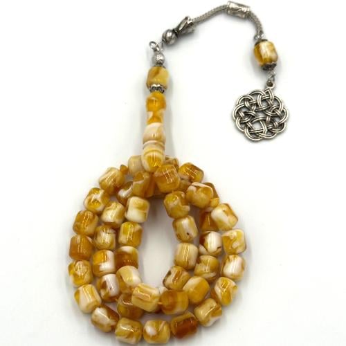 سبحة بكلايت لون اصفر مموج قصة برميلي - طربزونة معد...