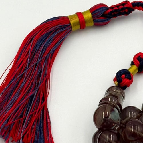 سبحة زعفران لون زيتي شفاف