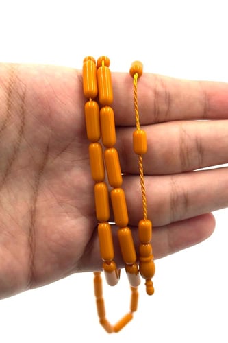 سبحة بكلايت قصة صنوبري لون كركمي - تمليكة