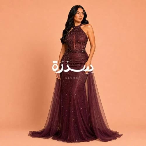 فستان سهرة بتطريزات فاخرة بالكامل