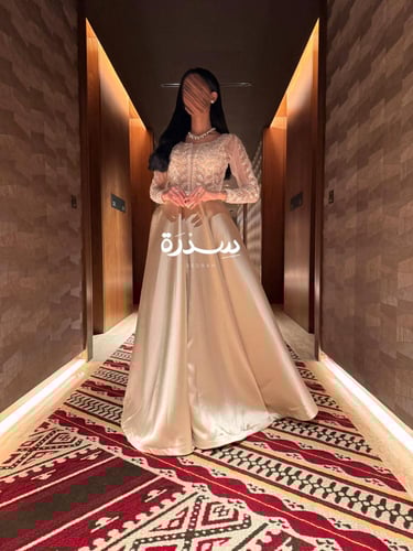 فستان سهرة بيج بتطريز