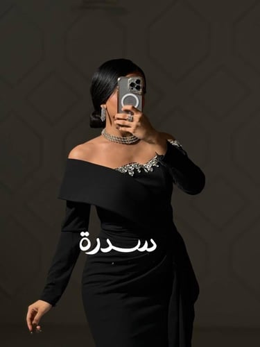 فستان سهرة كم طويل بتطريز مميز