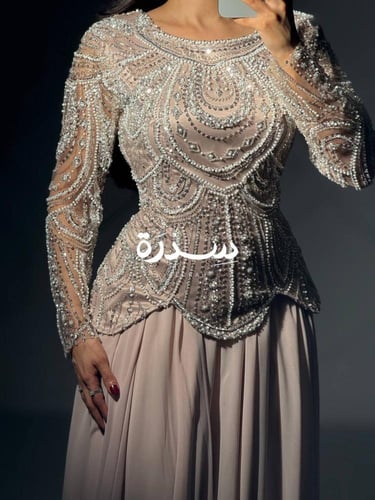 فستان سهرة مطرز أكمام طويله
